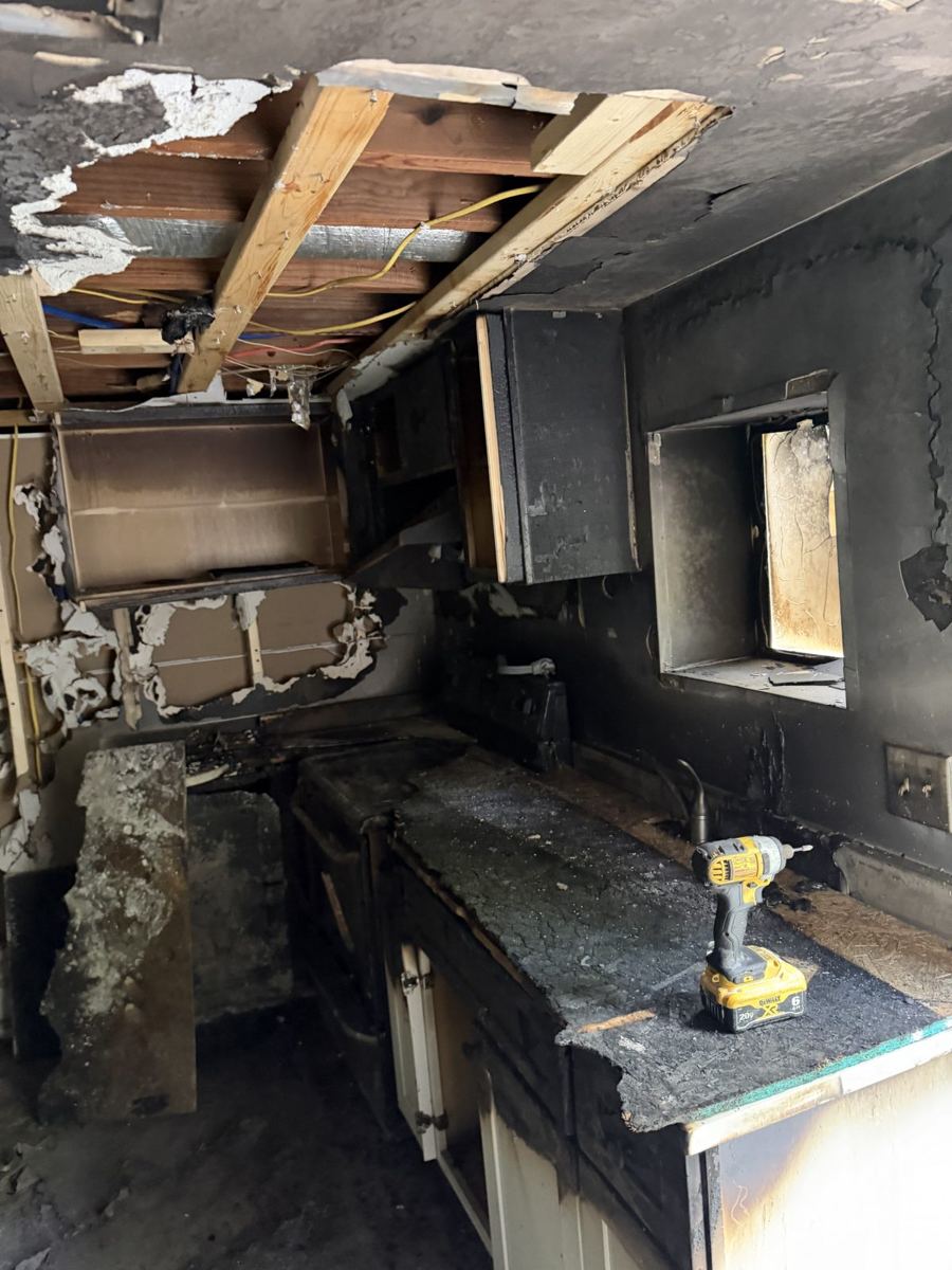 Damaged kitchen before demolition