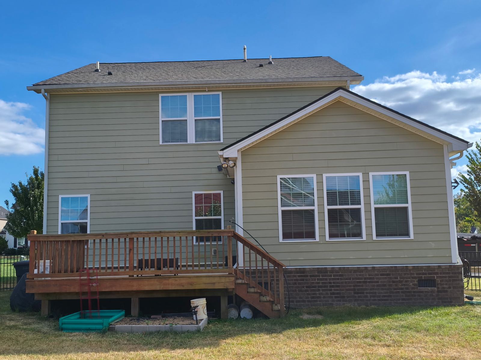 Back of home, roof replacement — after
