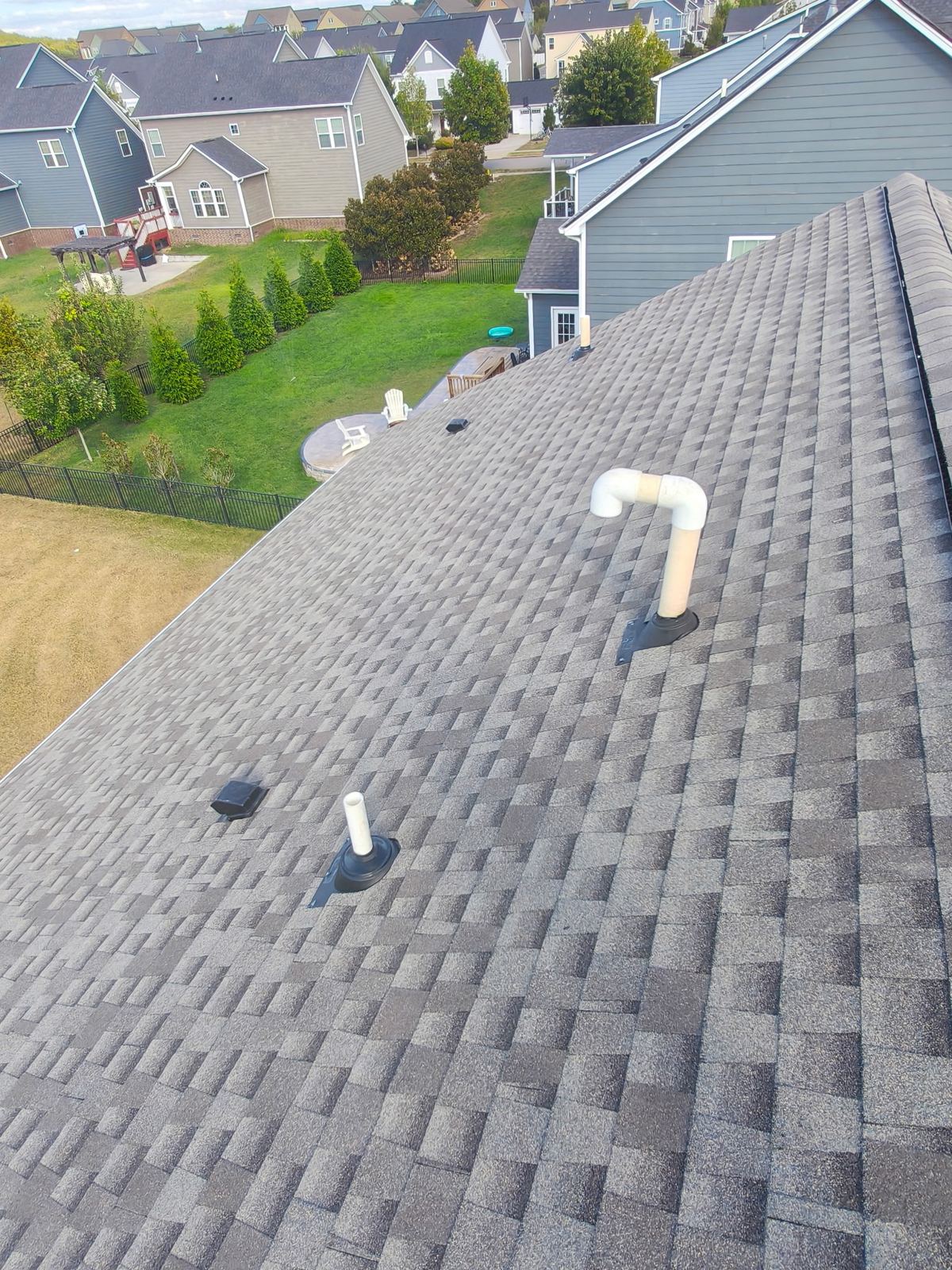 New shingles with new pipe boots and roof vents