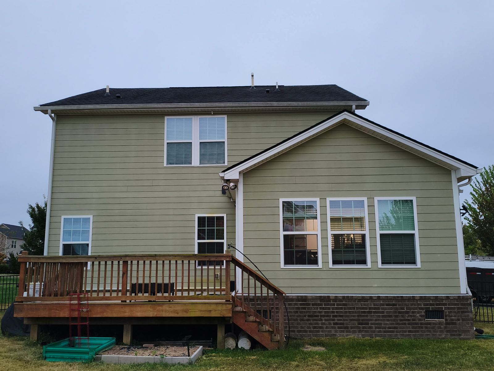 Back of home, roof replacement — before